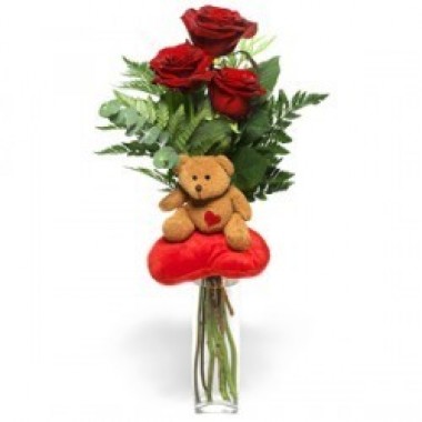 Little teddy bear with 3 roses