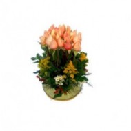  24 roses in a glass bowl.