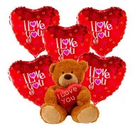 Valentine's arrangement of ballons with a teddy bear