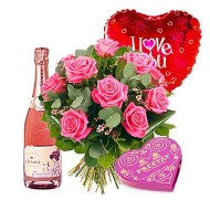 Wine, roses, chocolates and balloon