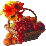 Frutal basket with lilies and sunflowers or gerberas